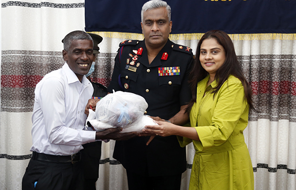Artillery Ladies Donate Dry Ration Packs to Civil Employees